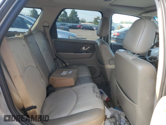 2005 Mercury Mariner Luxury z VIN 4M2CU57125DJ16694, wystawiony jako Copart lot #69063704 z przebiegiem 222 793 mil mil oraz Szkoda całkowita • Salvage title. Historia ofert i sprzedaży dostępna na DreamBid. Obrazek 11.