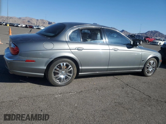 2003 Jaguar S-Type z VIN SAJEA01U03HM57757, wystawiony jako Copart lot #73440434 z przebiegiem 188 389 mil mil oraz Szkoda całkowita • Salvage title. Historia ofert i sprzedaży dostępna na DreamBid. Obrazek 3.