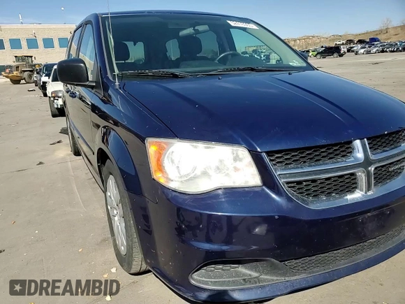 2014 Dodge Grand Caravan SE with VIN 2C4RDGBG4ER400512, listed as a Copart auction lot 52416965 with 141,475 mi miles and Clean Title. Bid and sale history available at DreamBid. Image 14.