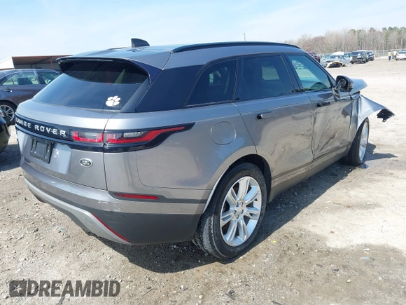 2020 Land Rover Range Rover Velar S z VIN SALYB2EX7LA259607, wystawiony jako IAAI lot #40980294 z przebiegiem 95 967 mil mil oraz . Historia ofert i sprzedaży dostępna na DreamBid. Obrazek 4.