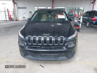 2015 Jeep Cherokee Sport with VIN 1C4PJLAB2FW539397, listed as a IAAI auction lot 42156576 with 120,409 mi miles. Bid and sale history available at carsss.com. Image 12.