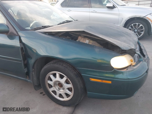 1999 Chevrolet Malibu LS with VIN 1G1NE52M3X6230247, listed as a IAAI auction lot 41712060 with 189,881 mi miles. Bid and sale history available at carsss.com. Image 17.