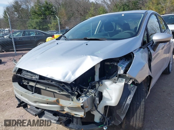 2018 Ford Fiesta SE with VIN 3FADP4BJ4JM134833, listed as a IAAI auction lot 41924079 with 76,781 mi miles and . Bid and sale history available at DreamBid. Image 6.