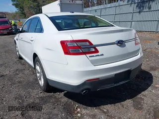 2015 Ford Taurus SE with VIN 1FAHP2D80FG176157, listed as a IAAI auction lot 41985771 with 102,252 mi miles and . Bid and sale history available at carsss.com. Image 3.