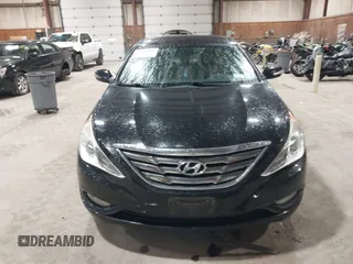 2012 Hyundai Sonata SE z VIN 5NPEC4AC9CH355351, wystawiony jako IAAI lot #42318588 z przebiegiem 122 864 mil mil oraz . Historia ofert i sprzedaży dostępna na DreamBid. Obrazek 12.