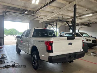 2022 Ford F-150 Lightning Pro with VIN 1FTVW1EL5NWG11725, listed as a IAAI auction lot 42832825 with 5,044 mi miles and . Bid and sale history available at DreamBid. Image 3.