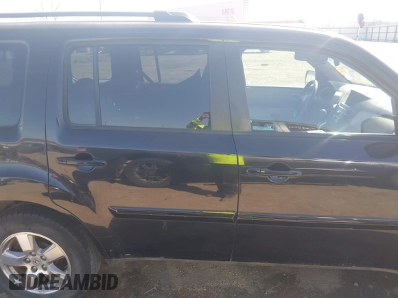 2011 Honda Pilot EX-L with VIN 5FNYF4H55BB039843, listed as a IAAI auction lot 41791186 with 126,737 mi miles. Bid and sale history available at carsss.com. Image 14.