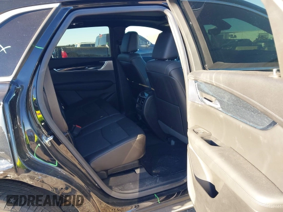 2024 Cadillac XT5 FWD Premium Luxury with VIN 1GYKNCRS4RZ729461, listed as a IAAI auction lot 41411300 with 5,760 mi miles. Bid and sale history available at carsss.com. Image 8.