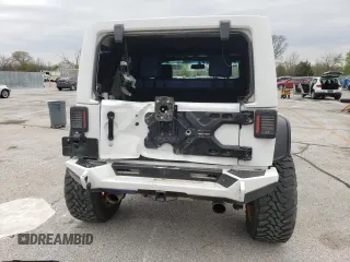 2017 Jeep Wrangler Unlimited Sport with VIN 1C4BJWDGXHL634930, listed as a Copart auction lot 52780985 with 74,873 mi miles and Salvage Title. Bid and sale history available at carsss.com. Image 6.