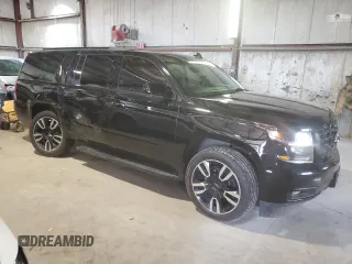 2019 Chevrolet Suburban Premier with VIN 1GNSKJKJ3KR150429, listed as a Copart auction lot 60276664 with 54,739 mi miles and Salvage Title. Bid and sale history available at DreamBid. Image 4.