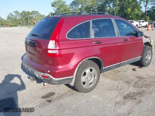 2007 Honda CR-V LX with VIN JHLRE38307C064754, listed as a IAAI auction lot 41797692 with 132,210 mi miles. Bid and sale history available at carsss.com. Image 4.