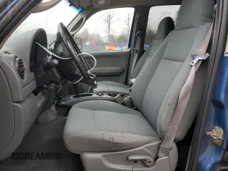 2005 Jeep Liberty Sport with VIN 1J4GL48535W610454, listed as a Copart auction lot 81914214 with 127,181 mi miles and Salvage Title. Bid and sale history available at DreamBid. Image 7.