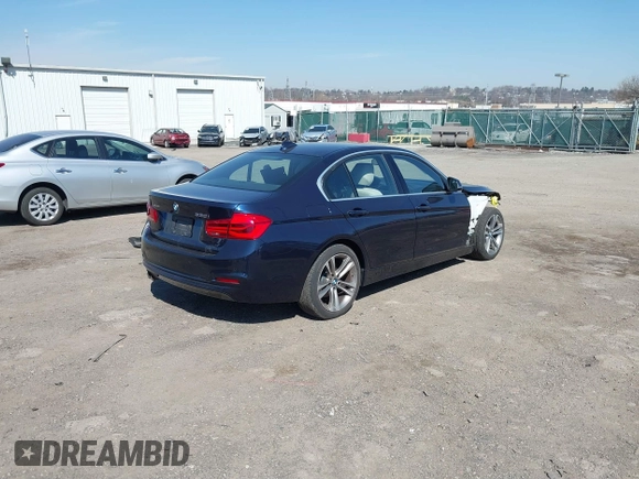 2017 BMW 3 Series 330i xDrive with VIN WBA8D9G37HNU65303, listed as a IAAI auction lot 41813598 with 43,072 mi miles. Bid and sale history available at carsss.com. Image 4.