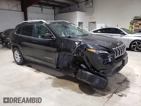 2016 Jeep Cherokee Latitude with VIN 1C4PJMCS5GW191468, listed as a Copart auction lot 58291485 with 106,695 mi miles and Salvage title. Bid and sale history available at DreamBid. Image 4.