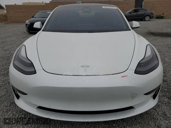 2021 Tesla Model 3 Standard Range Plus z VIN 5YJ3E1EAXMF065760, wystawiony jako Copart lot #54235345 z przebiegiem 54 413 mil mil oraz Szkoda całkowita • Salvage title. Historia ofert i sprzedaży dostępna na DreamBid. Obrazek 5.