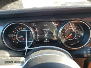 2021 Jeep Wrangler Unlimited Sahara High Altitude with VIN 1C4HJXEG4MW844446, listed as a Copart auction lot 76680594 with 27,124 mi miles and Salvage title. Bid and sale history available at DreamBid. Image 9.
