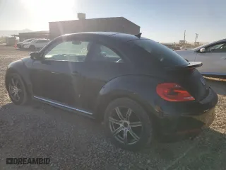 2012 Volkswagen Beetle 2.0T Turbo w/Sun/Sound PZEV with VIN 3VWVA7AT5CM628848, listed as a Copart auction lot 76992504 with 0 mi miles and Salvage Title. Bid and sale history available at carsss.com. Image 2.