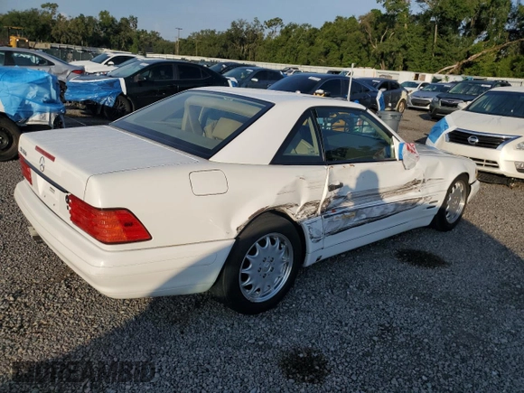 1997 Mercedes-Benz SL 500 with VIN WDBFA67FXVF149930, listed as a Copart auction lot 64749525 with 88,523 mi miles and Salvage title. Bid and sale history available at DreamBid. Image 3.