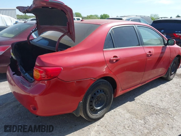 2009 Toyota Corolla with VIN 1NXBU40E09Z049359, listed as a IAAI auction lot 42041746 with 211,167 mi miles. Bid and sale history available at carsss.com. Image 4.