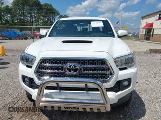 2017 Toyota Tacoma SR5 z VIN 5TFAZ5CN6HX047115, wystawiony jako IAAI lot #42124289 z przebiegiem 133 245 mil mil oraz . Historia ofert i sprzedaży dostępna na DreamBid. Obrazek 12.