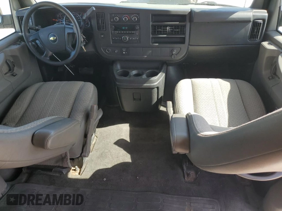 2012 Chevrolet Express Passenger 1LT z VIN 1GAZGYFG1C1154844, wystawiony jako Copart lot #64774005 z przebiegiem 181 261 mil mil oraz Szkoda całkowita • Salvage title. Historia ofert i sprzedaży dostępna na DreamBid. Obrazek 8.
