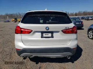 2017 BMW X1 xDrive28i with VIN WBXHT3C31H5F82700, listed as a Copart auction lot 48051095 with 76,861 mi miles and Salvage Title. Bid and sale history available at carsss.com. Image 6.