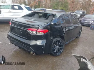 2021 Toyota Corolla SE with VIN 5YFS4MCE8MP061751, listed as a IAAI auction lot 40815693 with 80,450 mi miles. Bid and sale history available at carsss.com. Image 4.