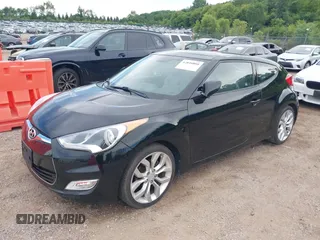 2012 Hyundai Veloster w/Gray Int with VIN KMHTC6AD6CU028810, listed as a IAAI auction lot 42818888 with 149,283 mi miles and . Bid and sale history available at DreamBid. Image 2.