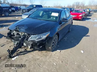 2019 Kia Optima S with VIN 5XXGT4L31KG355781, listed as a IAAI auction lot 41833796 with 130,804 mi miles. Bid and sale history available at carsss.com. Image 2.