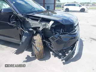2023 Volkswagen Atlas SE with VIN 1V2WC2CA4PC217463, listed as a IAAI auction lot 41996379 with 13,578 mi miles and . Bid and sale history available at DreamBid. Image 6.