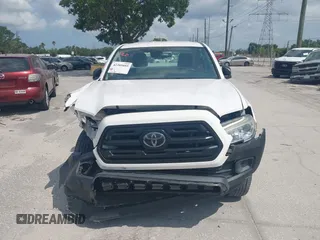 2018 Toyota Tacoma SR with VIN 5TFRX5GN6JX129435, listed as a IAAI auction lot 42205055 with 105,985 mi miles and . Bid and sale history available at DreamBid. Image 12.