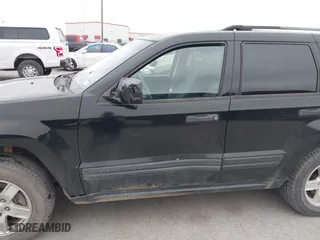 2006 Jeep Grand Cherokee Laredo with VIN 1J4GS48KX6C322538, listed as a IAAI auction lot 41282093 with 176,901 mi miles. Bid and sale history available at carsss.com. Image 6.