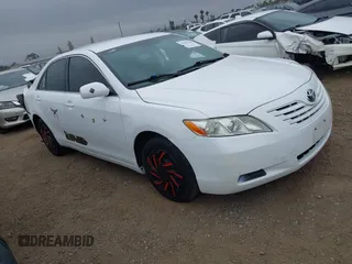 2009 Toyota Camry z VIN 4T4BE46K59R063502, wystawiony jako IAAI lot #42386409 z przebiegiem 157 213 mil mil oraz . Historia ofert i sprzedaży dostępna na DreamBid. Obrazek 1.