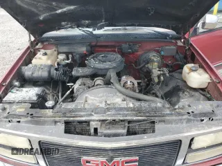 1990 GMC Sierra 1500 z VIN 1GTFC24K8LE514419, wystawiony jako Copart lot #57265335 z przebiegiem 162 045 mil mil oraz Szkoda całkowita • Salvage title. Historia ofert i sprzedaży dostępna na DreamBid. Obrazek 11.