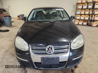 2009 Volkswagen Jetta SE with VIN 3VWRZ71K09M166838, listed as a Copart auction lot 62273635 with 156,816 mi miles and Salvage title. Bid and sale history available at DreamBid. Image 5.