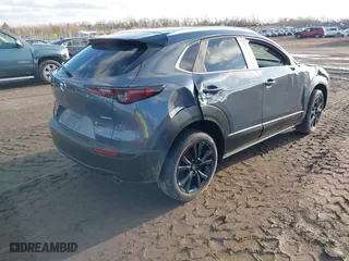 2022 Mazda CX-30 2.5 S Preferred Package with VIN 3MVDMBCL3NM422497, listed as a IAAI auction lot 41236220 with 57,752 mi miles. Bid and sale history available at carsss.com. Image 4.