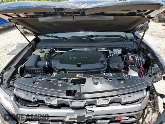 2022 Chevrolet Colorado 2WD Z71 z VIN 1GCGSDEN6N1204453, wystawiony jako Copart lot #65275975 z przebiegiem 23 734 mil mil oraz Szkoda całkowita • Salvage title. Historia ofert i sprzedaży dostępna na DreamBid. Obrazek 12.