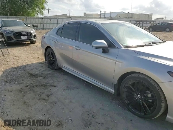 2022 Toyota Camry Hybrid XSE z VIN 4T1K31AK2NU571829, wystawiony jako Copart lot #52363675 z przebiegiem 52 918 mil mil oraz Szkoda całkowita • Salvage title. Historia ofert i sprzedaży dostępna na DreamBid. Obrazek 11.