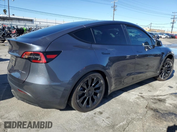2023 Tesla Model Y Long Range with VIN 7SAYGDEE2PA047794, listed as a Copart auction lot 48397305 with 18,850 mi miles and Salvage Title. Bid and sale history available at DreamBid. Image 3.