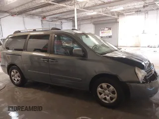 2009 Kia Sedona LX with VIN KNDMB233X96276905, listed as a IAAI auction lot 41394768 with 231,156 mi miles. Bid and sale history available at carsss.com. Image 14.