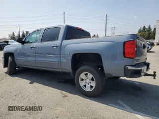 2015 Chevrolet Silverado 1500 LT with VIN 3GCPCREC1FG445638, listed as a Copart auction lot 55586395 with 106,317 mi miles and Salvage Title. Bid and sale history available at DreamBid. Image 2.