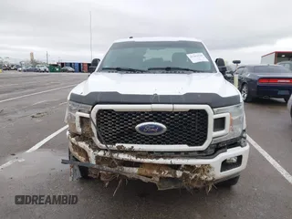 2018 Ford F-150 XL with VIN 1FTEW1E59JKD99284, listed as a IAAI auction lot 41203530 with 153,800 mi miles. Bid and sale history available at carsss.com. Image 12.