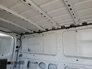 2021 Nissan NV Cargo S z VIN 1N6BF0KM2MN807343, wystawiony jako Copart lot #49956085 z przebiegiem 53 236 mil mil oraz Szkoda całkowita • Salvage title. Historia ofert i sprzedaży dostępna na DreamBid. Obrazek 10.