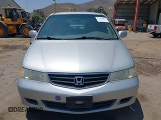2004 Honda Odyssey EX-L with VIN 5FNRL18774B028164, listed as a IAAI auction lot 42454877 with 135,720 mi miles and . Bid and sale history available at DreamBid. Image 12.