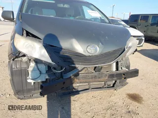 2012 Toyota Sienna LE with VIN 5TDJK3DCXCS039801, listed as a IAAI auction lot 41483248 with 165,548 mi miles. Bid and sale history available at carsss.com. Image 6.