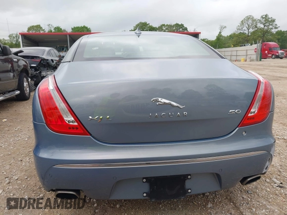 2013 Jaguar XJ with VIN SAJWA2G17DLV57561, listed as a IAAI auction lot 41928575 with 108,794 mi miles. Bid and sale history available at carsss.com. Image 17.