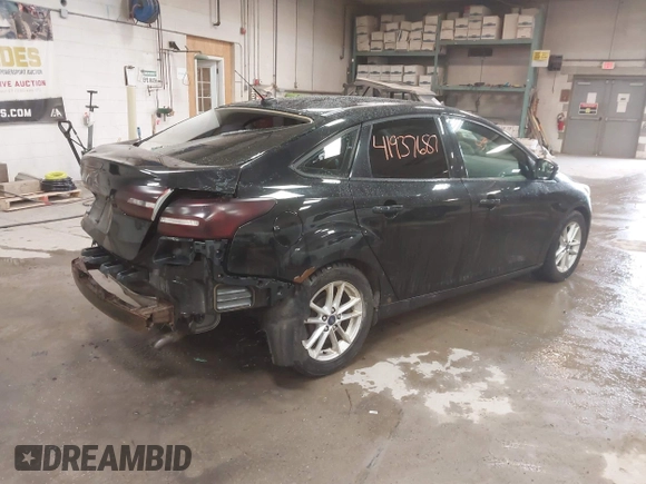 2015 Ford Focus SE with VIN 1FADP3F24FL285287, listed as a IAAI auction lot 41937687 with 130,460 mi miles. Bid and sale history available at carsss.com. Image 4.