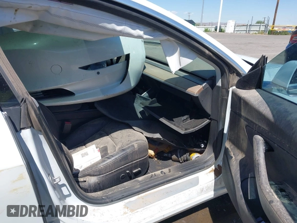2018 Tesla Model 3 Long Range Battery with VIN 5YJ3E1EA3JF057527, listed as a IAAI auction lot 42072126 with 1 mi miles. Bid and sale history available at carsss.com. Image 5.