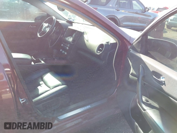 2013 Nissan Maxima S with VIN 1N4AA5AP5DC847780, listed as a IAAI auction lot 42018318 with 128,839 mi miles and . Bid and sale history available at DreamBid. Image 5.