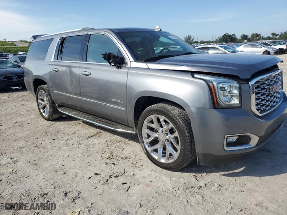 2020 GMC Yukon XL Denali with VIN 1GKS1HKJ8LR293922, listed as a Copart auction lot 76233074 with 67,273 mi miles and Salvage Title. Bid and sale history available at carsss.com. Image 4.